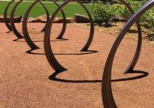 These rings are more than just a work of art, they are also a bike rack for visitors to use